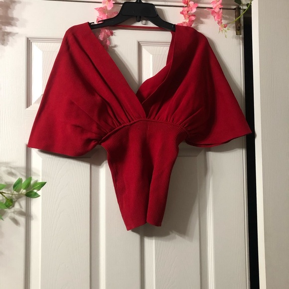 Ruby red deep V neck short sleeve. Form fitted middle - Picture 2 of 3